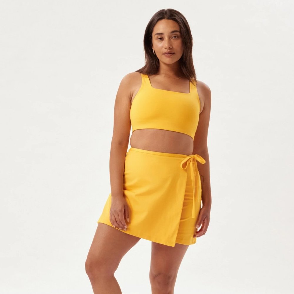 LE Girlfriend Collective Weekend Wrap Skort in Citrine